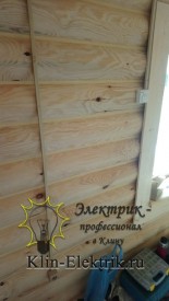 Электрика по оцилендрованному брусу