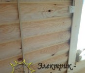 Электрика по оцилендрованному брусу
